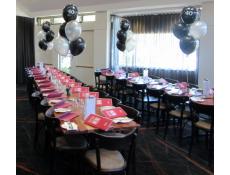 40th Birthday theme table balloon arrangements black & silver \ The Herdsman Private Function Room | corporaterewards.com.au