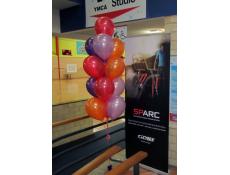Balloon Arrangements with purple, lilac, orange & red metallic balloons | YMCA Morley
www.corporaterewards.com.au